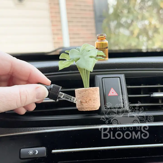 Monstera vent clip car diffuser in a cork pot, photo 1