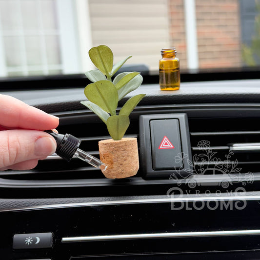 Fiddle leaf vent clip car diffuser in a cork pot, photo 1